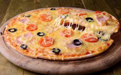 Tasty pizza on table close-up