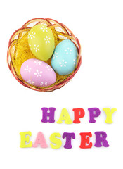 Easter eggs in nest and Happy Easter sign, isolated on white
