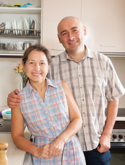 couple at home kitchen
