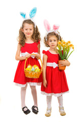 Beautiful sisters in red dresses