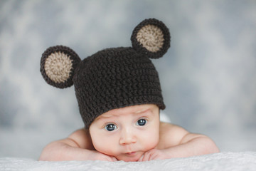 Closeup portrait of cute baby in handmaded hat