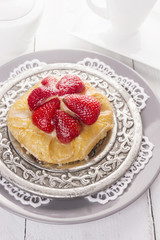 strawberry cake on silver plate