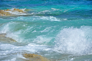 Waves crushing on a rocky beach