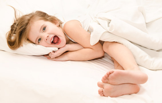 Adorable Little Girl Waked Up In Her Bed