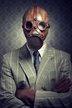 Vintage Businessman Wearing Gas Mask