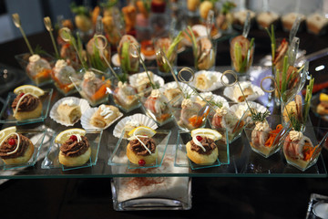 Colorful desserts and pastry served on a wedding party