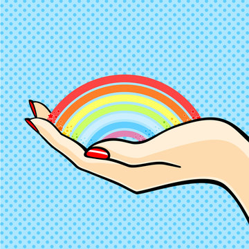 Woman holding a rainbow