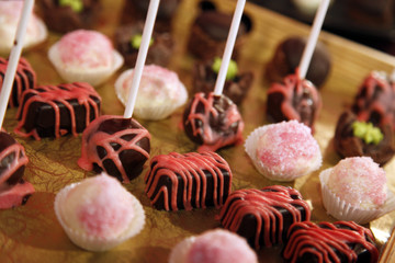 Colorful desserts and pastry served on a wedding party