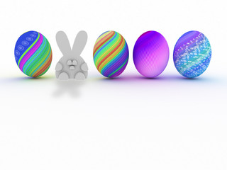 Easter bunny and colorful eggs isolated on white background