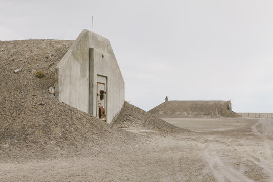 Abandoned munitions bunkers in desert