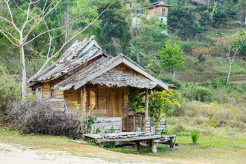 Fototapeta na wymiar Thai style wooden hut of hill-tribe, Thailand