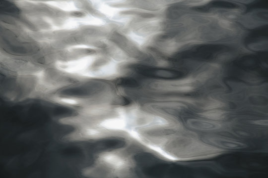 Close up of sunlight reflecting on moving water in Puget Sound, Washington, USA.