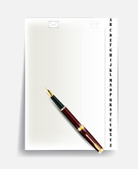 notebook page with alphabet and pen with gold nib