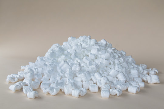 Heap of packaging shapes, white polystyrene material. 