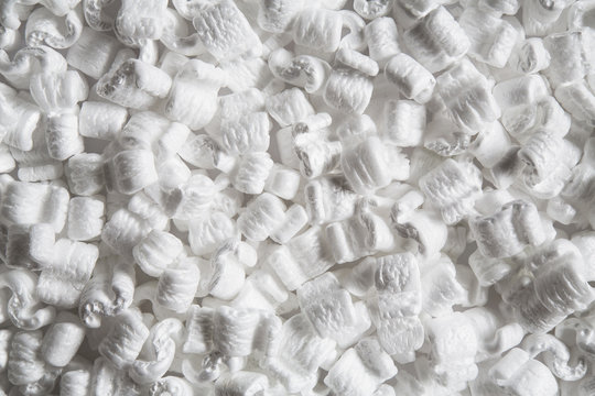 Heap of packaging shapes, white polystyrene material. 