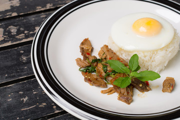 Pork fried with basil
