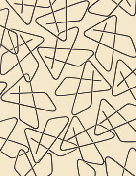 A large group of objects, a type of paperclip, metal bent into a butterfly shape on a pale pink background.