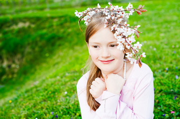 Spring portrait of adorable little girl