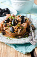 Chicken stew with olives and nuts
