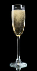 Glass of champagne, on black background