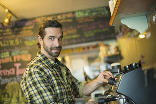 A coffee shop and cafe in High Falls called The Last Bite. A man making coffee. 