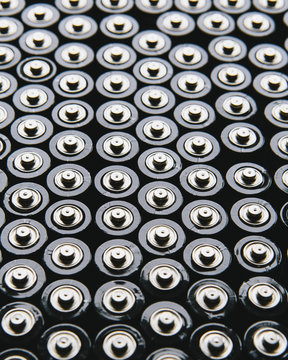 Rows of double A batteries, close up