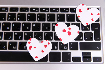 Bright hearts on computer keyboard close up