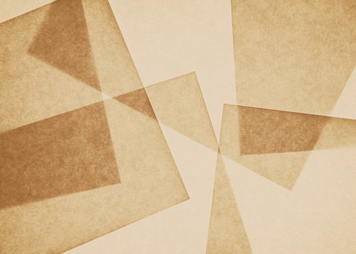 Overlapping pieces of recycled paper.