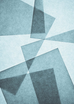 Overlapping pieces of recycled paper