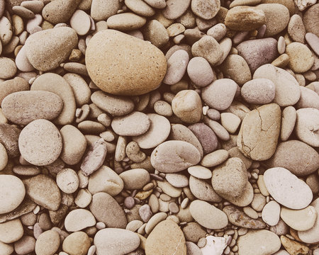 A heap of polished pebbles and small flat stones in Olympic national park. 