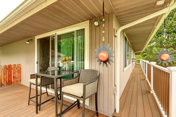 Walkout deck with wicker table set