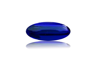 blue vitamins on white background