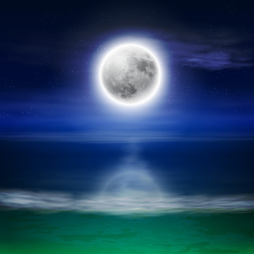 Beach with full moon at night