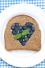 bread with the middle filled with blueberries