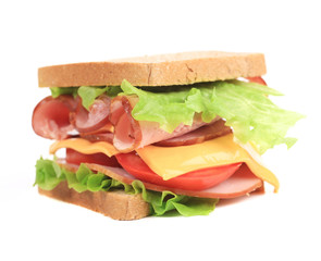 Sandwich with bacon and vegetables.