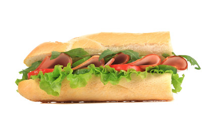 Sandwich with bacon and vegetables.