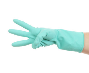 Hand shows three in rubber glove.