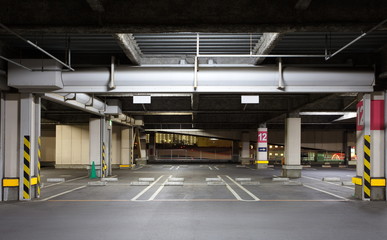 Parking garage underground interior, neon lights in dark