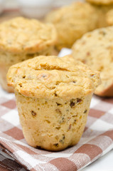 snack muffins with dried peppers and onions on a plate close-up
