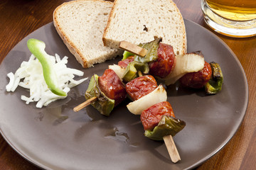 Grilled sausage on spit
