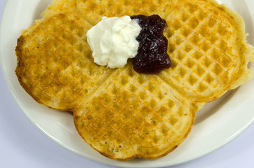 Waffle with jam and cream