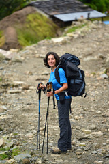 Trekking young woman in the Himalayas