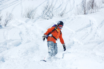 Fototapeta na wymiar Snowboarder in action
