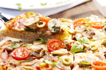 Pizza with ham and mushrooms