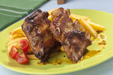 Grilled ribs on plate