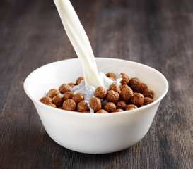 Bowl of chocolate cereal on a table