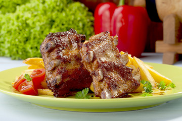 Grilled ribs on plate