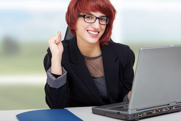 Woman working on laptop