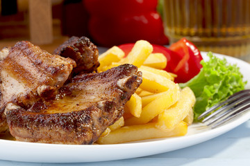 Grilled ribs on plate