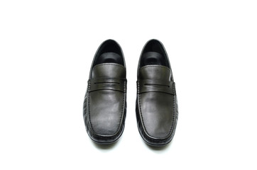 Black leather shoes on white background